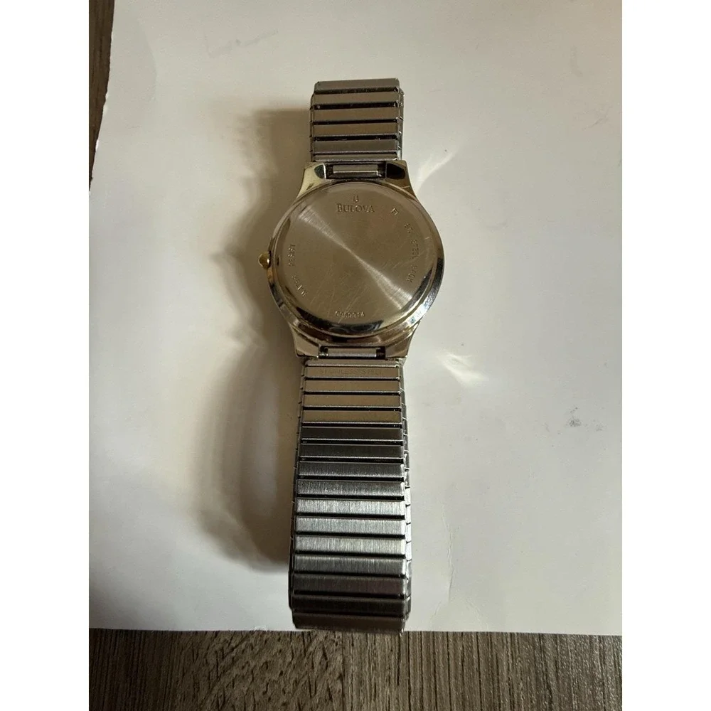 Caravelle by Bulova quartz watch — excellent condition, two-tone finish.